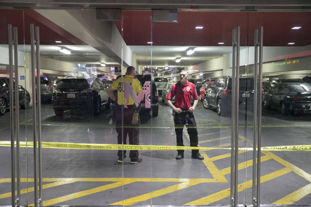 Security guards near the entrance of the parking garage near the Miracle Mile Shops at The Strip in  Las Vegas, Thursday, July 13, 2017. Fox was found guilty for attempted murder, battery, and dis ...