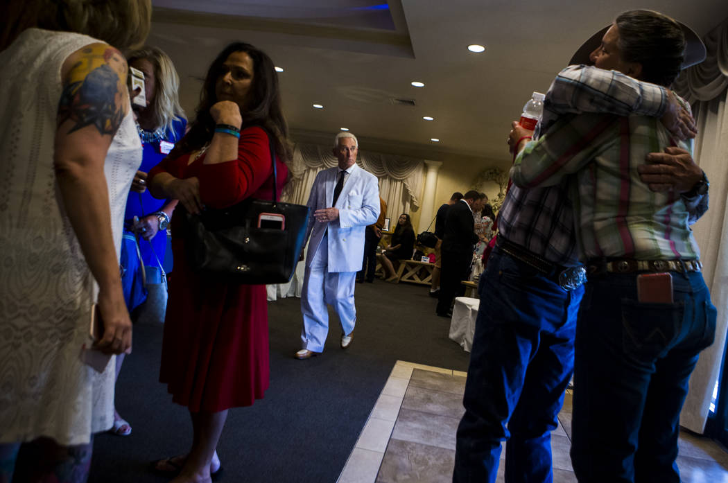Political consultant Roger Stone, center, before speaking at a fundraising event in support of the Bundy family at Rainbow Gardens in Las Vegas on Saturday, July 15, 2017. Chase Stevens Las Vegas ...