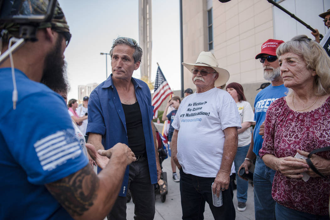 Journalist Charlie LeDuff meets with protestors at a rally to support defendants in the Bundy standoff case at the Lloyd George U.S. Courthouse on Saturday, July 15, 2017, in Las Vegas. Morgan Lie ...