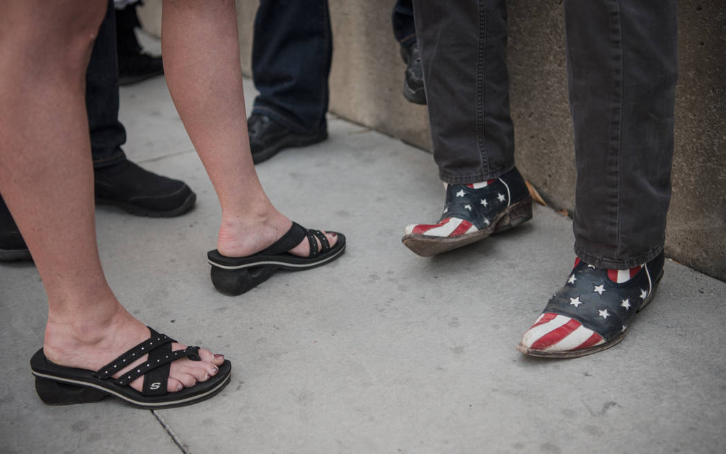 Journalist Charlie LeDuff wears American themed cowboy boots at a rally to support defendants in the Bundy standoff case at the Lloyd George U.S. Courthouse on Saturday, July 15, 2017, in Las Vega ...