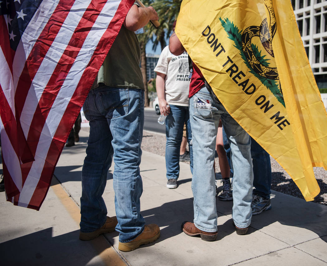Protesters at a rally to support defendants in the Bundy standoff case at the Lloyd George U.S. Courthouse on Saturday, July 15, 2017, in Las Vegas. Morgan Lieberman Las Vegas Review-Journal