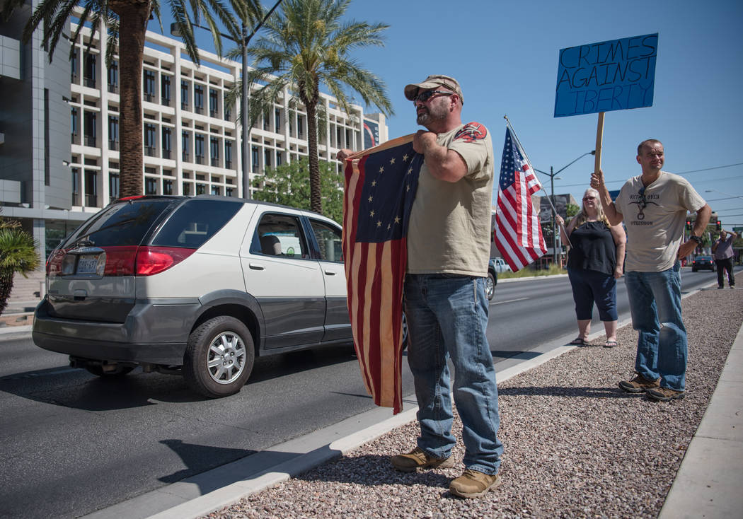 Colorado resident Troy Walker participates in a rally to support defendants in the Bundy standoff case at the Lloyd George U.S. Courthouse on Saturday, July 15, 2017, in Las Vegas. Morgan Lieberma ...
