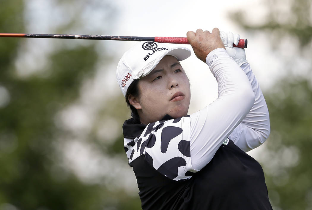 China's Shanshan Feng tees off on the eighth hole during the final round of the U.S. Women's Open Golf tournament Sunday, July 16, 2017, in Bedminster, N.J. (AP Photo/Seth Wenig)