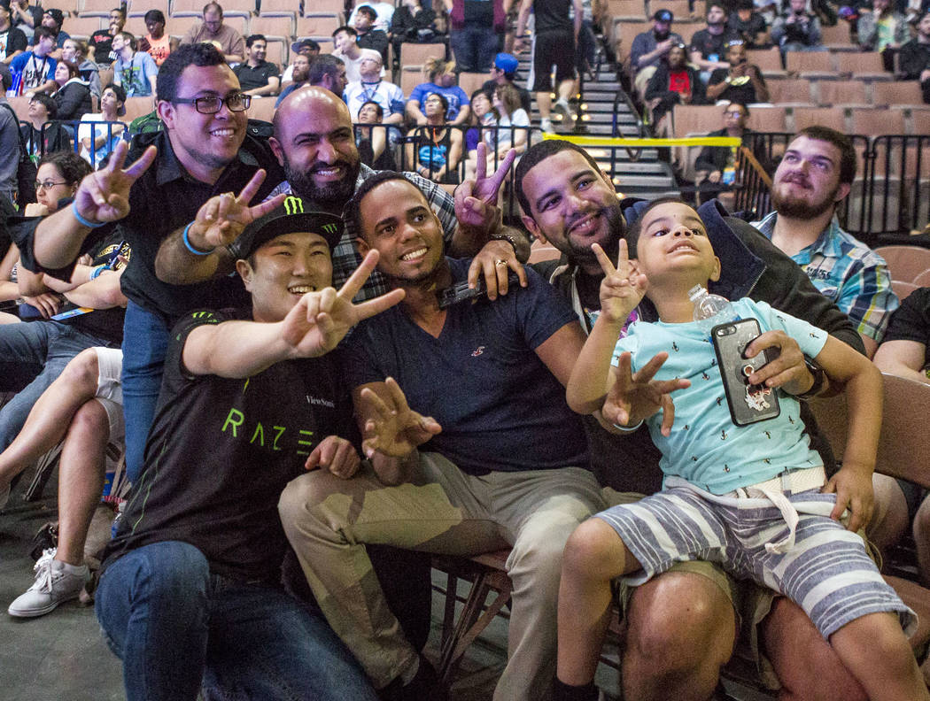Attendees have their photo taken during the Evo 2017 Championship Series, a fighting game tournament, at the Mandalay Bay Events Center on Sunday, July 16, 2017.  Patrick Connolly Las Vegas Review ...