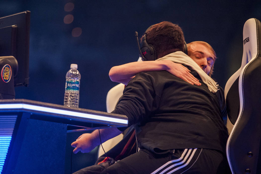 Gavin Dempsey aka "Tweek" hugs Gonzalo Barrios aka ҚeRoӠ after ZeRo won the round of Super Smash Bros. during the Evo 2017 Championship Series, a fighting game tourna ...