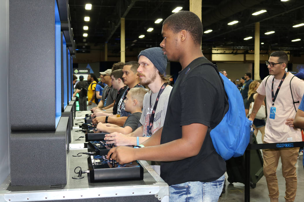 Chris Swan, 28, known as Dynasty, in the gaming world plays the latest version of a video game called "Marvel vs. Capcom: Infinite" at the 2017 Evolution Championship Series Friday, July 14, 2017 ...
