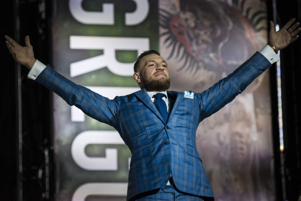 Conor McGregor gestures to the crowd during a promotional stop with Floyd Mayweather in Toronto on Wednesday, July 12, 2017, for their upcoming boxing match in Las Vegas. (Christopher Katsarov/The ...