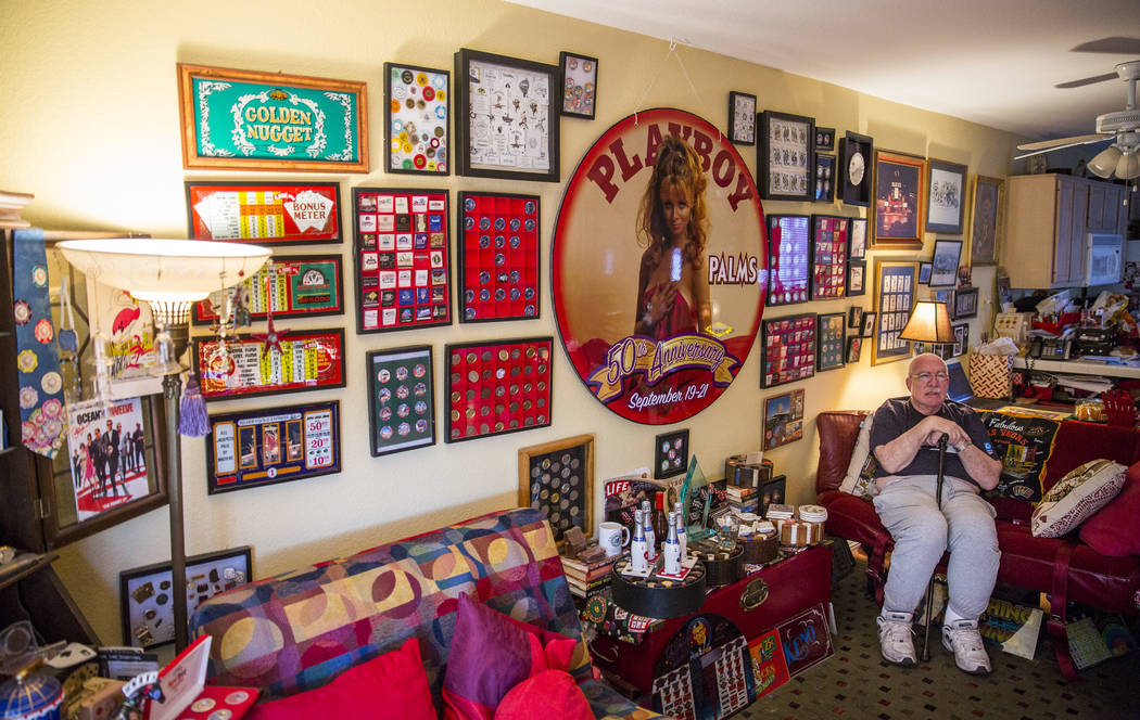 Sheldon Smith sits in the living room of his Las Vegas home, surrounded by pieces of his casino collection. (Todd Prince/Las Vegas Review-Journal)