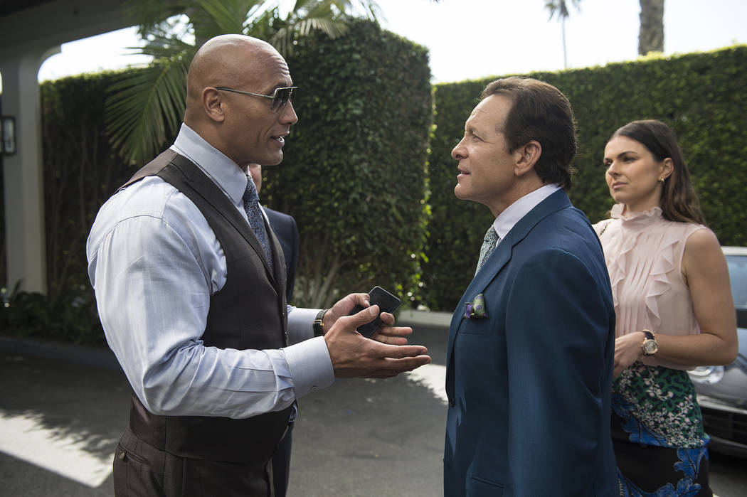 From left, Dwayne Johnson, Steve Guttenberg and Serinda Swan appear in a scene from HBO's "Ballers." Jeff Daly courtesy of HBO