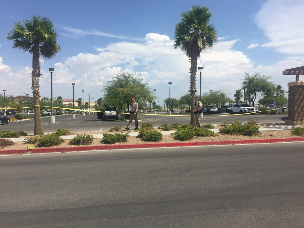 Las Vegas police investigate the scene of an officer-involved shooting in a shopping center at the 6700 block of North Durango Drive in Las Vegas on Tuesday, July 18, 2017. (Marian Green/Las Vegas ...