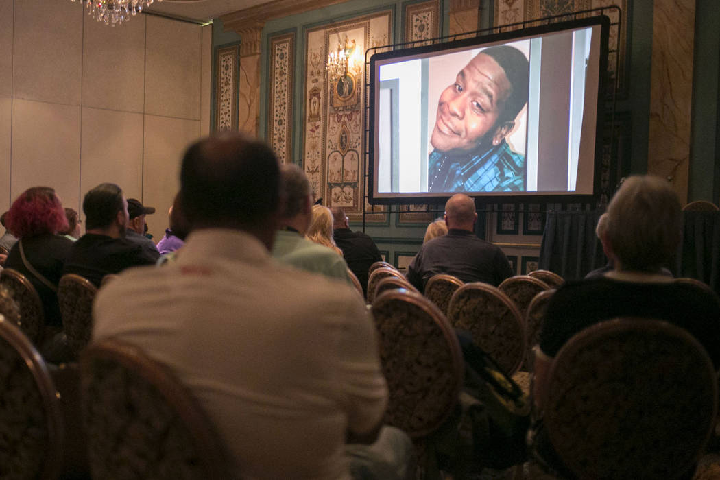 A photo of Trevon Cole appears during the documentary җhat Happened in Vegas,&quot; during the Anthem Libertarian Film Festival at the Paris Las Vegas in Las Vegas, Thursday, July 20, 20 ...