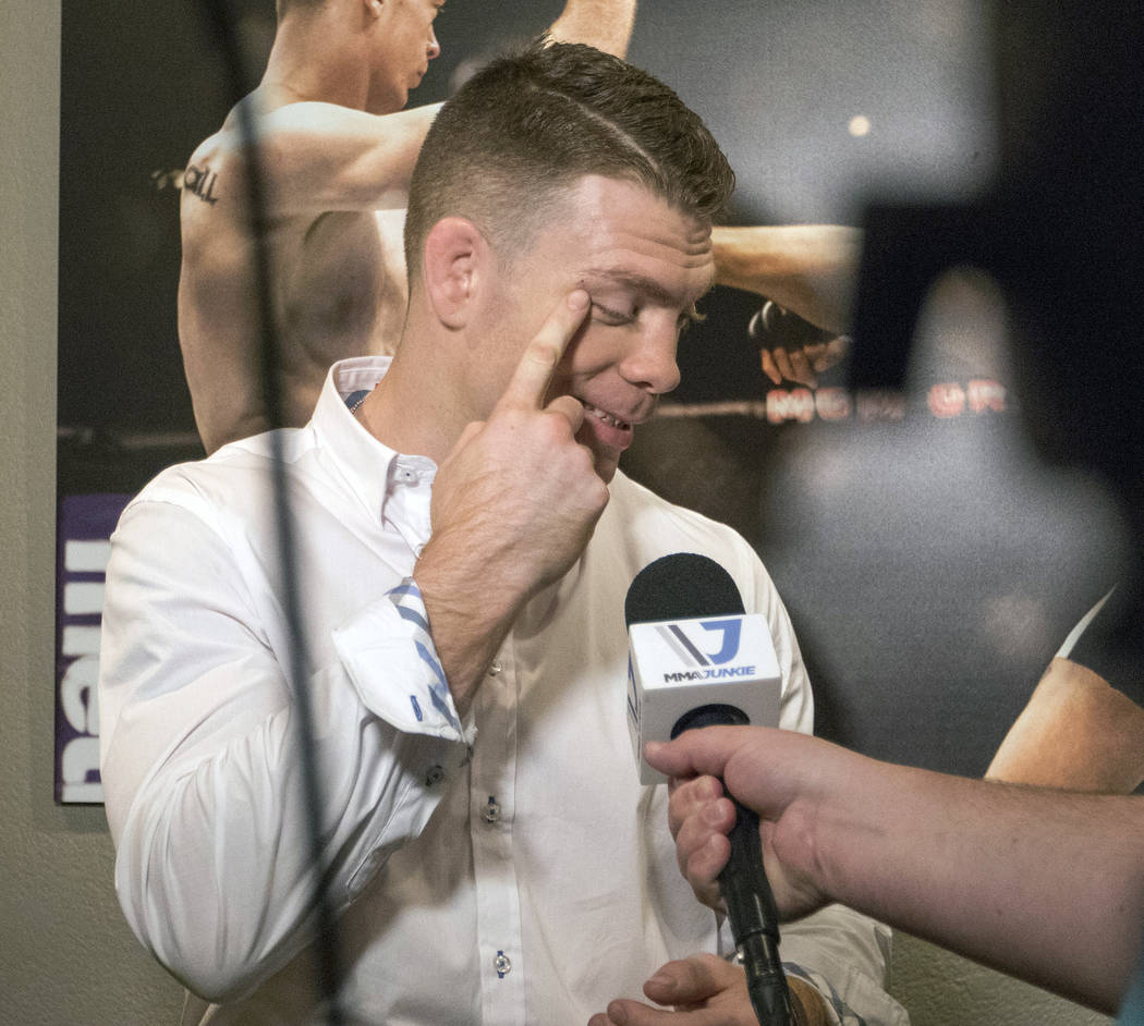 Paul Felder points to the stitch he got after his victory over Stevie Ray at UFC Fight Night 113 as he is interviewed by media at The Ultimate Fighter gym in Las Vegas on Tuesday, July 18, 2017. H ...