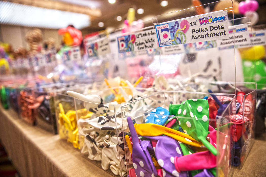 Rows of large bins of multicolored balloons fill one of two meeting rooms during the Bling Bling Jam Balloon Convention on Tuesday, July 25, 2017, at the Golden Nugget hotel-casino, in Las Vegas. ...