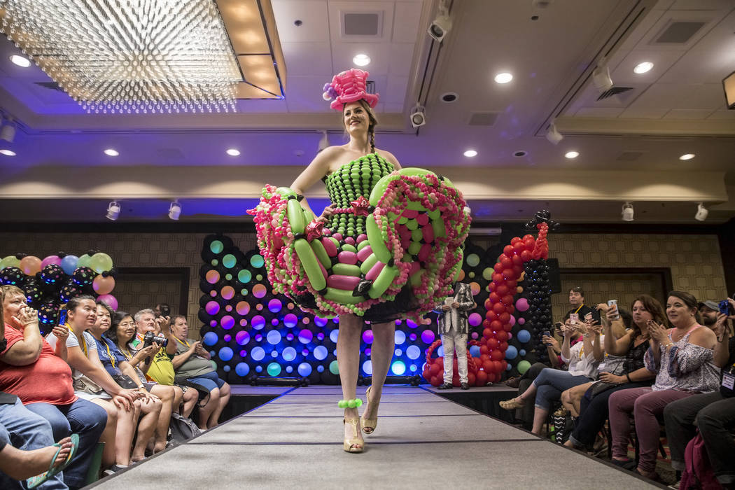 Models walk the runway during the fashion show at the Bling Bling Jam Balloon Convention on Wednesday, July 26, 2017, at the Golden Nugget hotel-casino, in Las Vegas. Benjamin Hager Las Vegas Revi ...