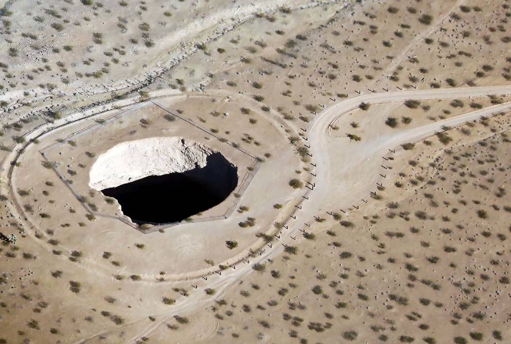An aerial photo of a deep sink hole known as ''Devil's Throat'' in Gold Butte National Monument on Friday, July 21, 2017. Gold Butte is the name for both a mountain peak and nearby ghost town in t ...