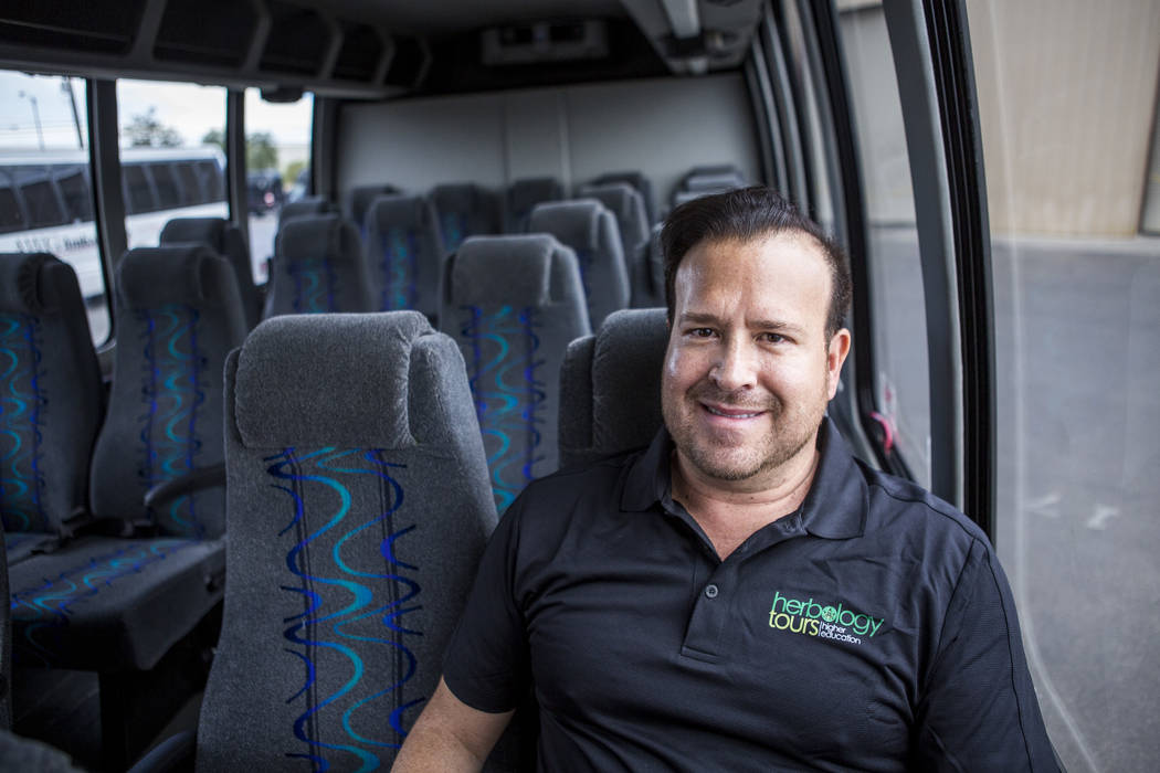 Matthew Miner, owner and CEO of Herbology Tours, stands on a bus at AWG Ambassador in Las Vegas on Monday, July 24, 2017. (Patrick Connolly/Las Vegas Review-Journal) @PConnPie