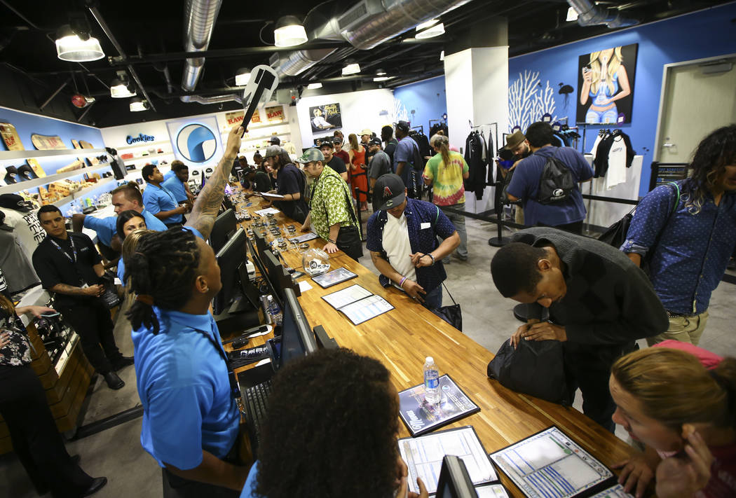 Customers line up to be some of the first people to legally purchase recreational marijuana at Reef Dispensaries in Las Vegas on Saturday, July 1, 2017. (Chase Stevens/Las Vegas Review-Journal) @c ...