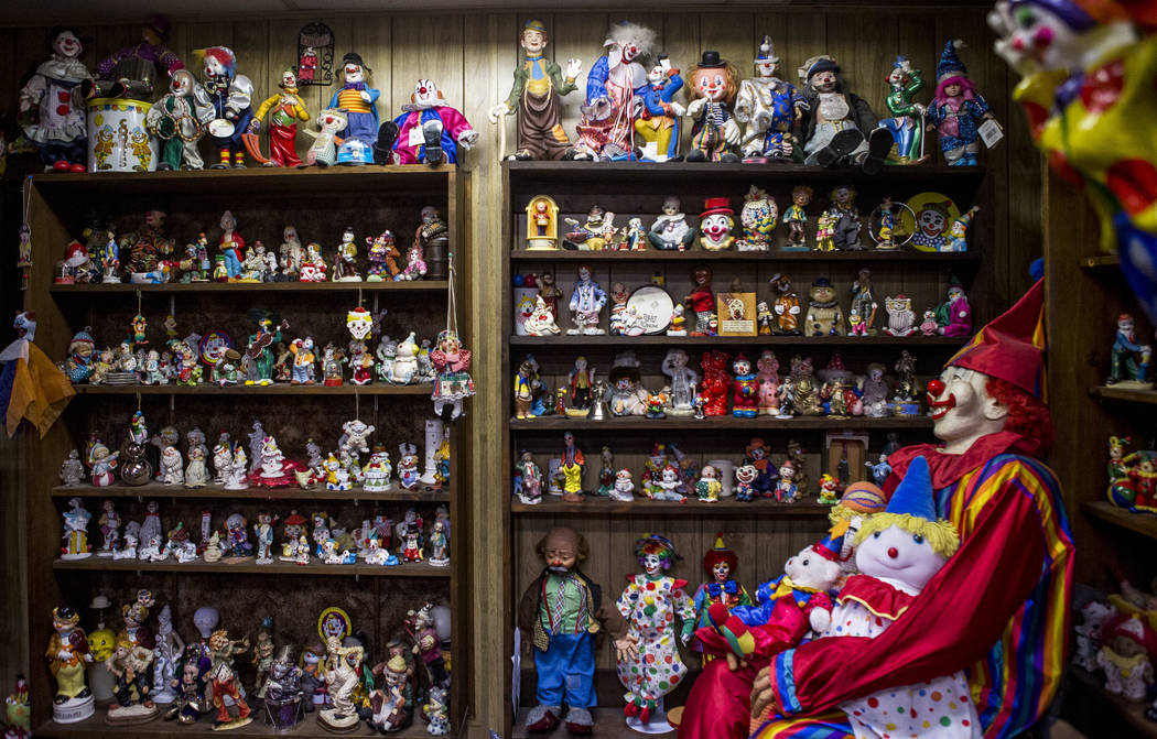About 600 clowns crowd into the lobby of the Clown Motel in Tonopah on Tuesday, July 25, 2017. The Clown is currently for sale with the condition that the new owner must keep the clown theme.  Pat ...
