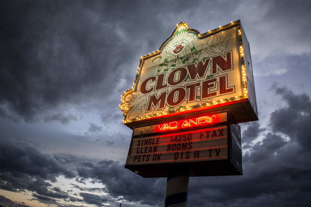 The Clown Motel sign glows as the sun sets in Tonopah on Tuesday, July 25, 2017. The Clown is currently for sale with the condition that the new owner must keep the clown theme.  Patrick Connolly  ...