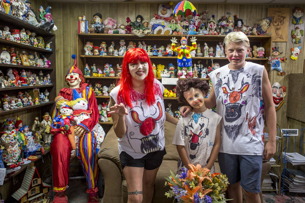 Penny James with her sons Kai, 9, and Caden, 15, in the lobby of the Clown Motel in Tonopah on Tuesday, July 25, 2017. The Las Vegas residents came to stay for a night and dressed up in clown atti ...