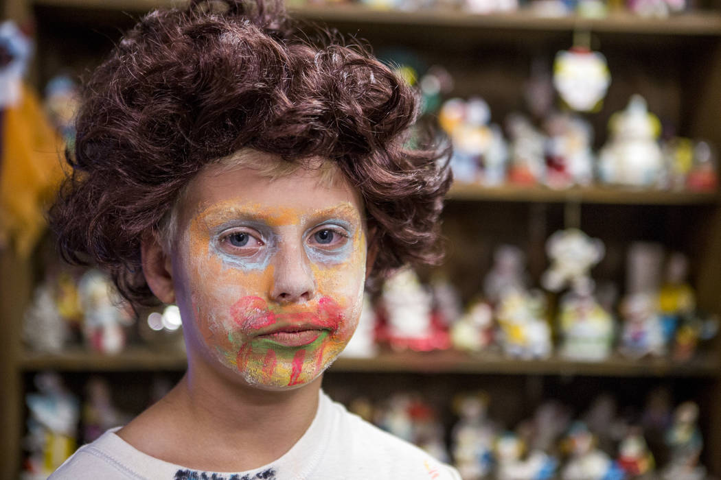 Kai James, 9, in the lobby of the Clown Motel in Tonopah on Tuesday, July 25, 2017. James came with his brother and mother from Las Vegas to stay for a night and dressed up in clown attire.  Patri ...