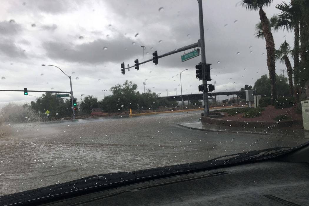 Flooding at Elkhorn Road and Buffalo Drive in northwest Las Vegas, Tuesday morning, July 25, 2017. (Kerry Blanchfield/Las Vegas Review-Journal)