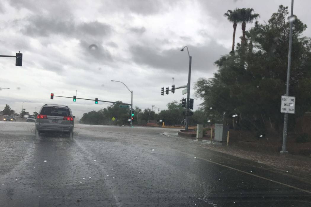 Flooding at Elkhorn Road and Buffalo Drive in northwest Las Vegas, Tuesday morning, July 25, 2017. (Kerry Blanchfield/Las Vegas Review-Journal)