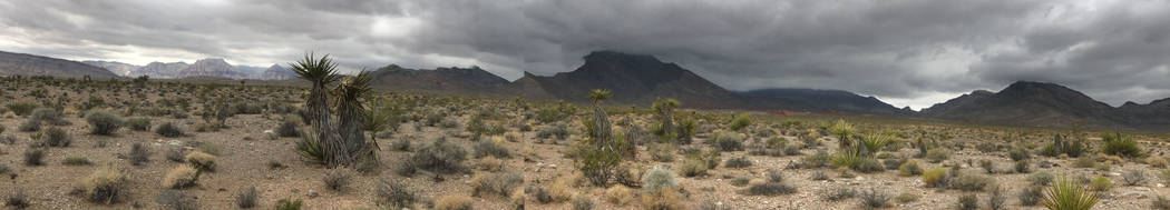 ****A panoramic photo by mobile device.****
Rain clouds roll over Little Red Rocks on the Las Vegas Valley's west rim Tuesday, July 25, 2017.  Keith Rogers Las Vegas Review-Journal
