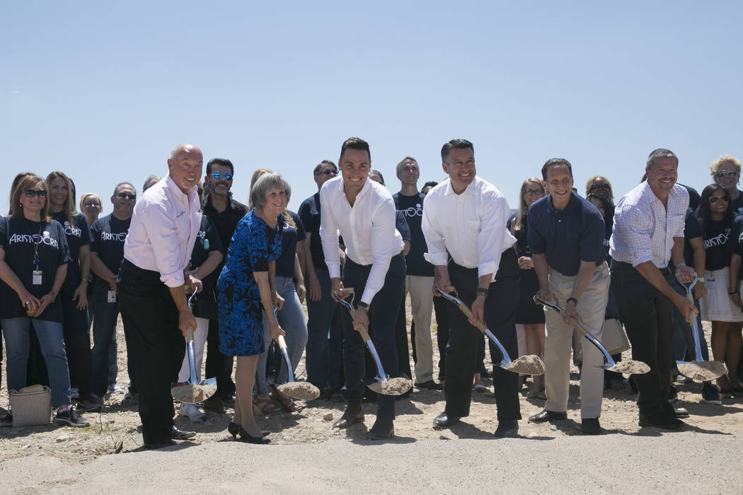 From left: Kevin T. Orrock, Summerlin president of the Howard Huges Corp., Susan Brager, Clark County commissioner, Matt Wilson, managing director of the Americas for Aristocrat, Gov. Brian Sandov ...
