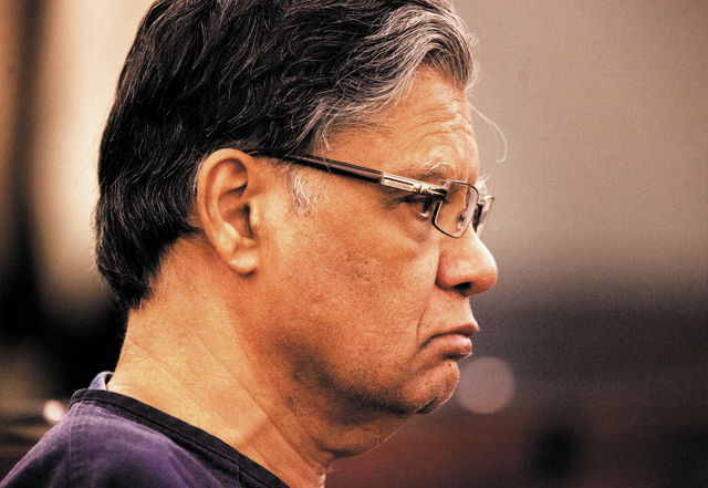 Dr. Dipak Desai as seen Thursday, Oct. 24, 2013 during sentencing at Regional Justice Center. Desai was sentenced to life in prison with the possibility of parole after 18 years for his criminal ...