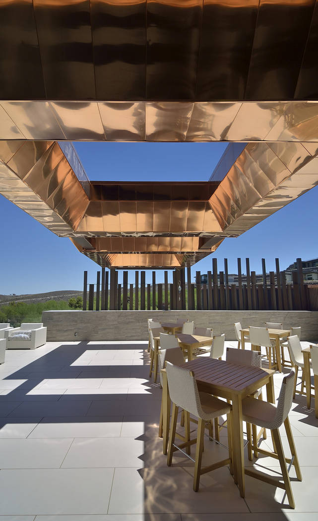 The Ascaya clubhouse features a copper-accented porte-cochere. (Bill Hughes Real Estate Millions)