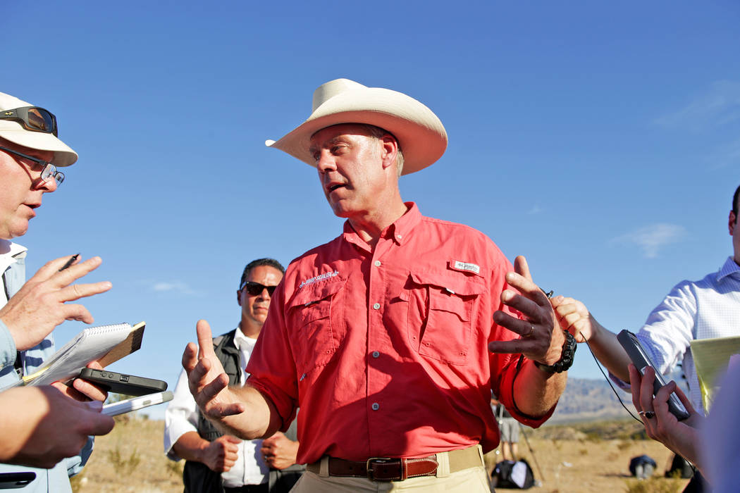 Interior Secretary Ryan Zinke talks to the media on Sunday, July 30, 2017, outside a private home in Bunkerville. Zinke is in the area to discuss the review of Nevada's Gold Butte and the Basin an ...