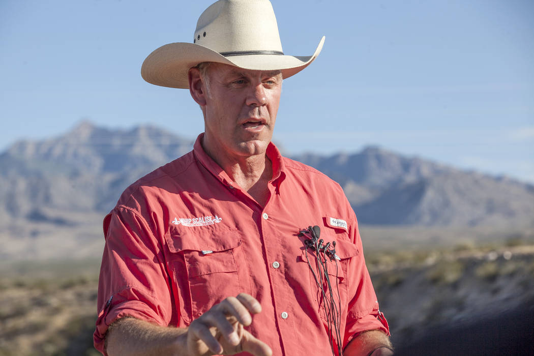 Interior Secretary Ryan Zinke talks to the media on Sunday, July 30, 2017, outside a private home in Bunkerville. Zinke is in the area to discuss the review of Nevada's Gold Butte and the Basin an ...