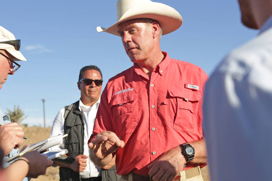 Interior Secretary Ryan Zinke talks to the media on Sunday, July 30, 2017, outside a private home in Bunkerville. Zinke is in the area to discuss the review of Nevada's Gold Butte and the Basin an ...