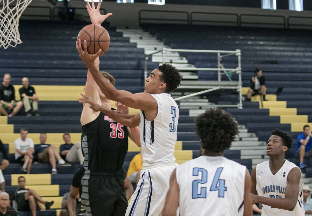 Howard Pulley Panthers point guard Tre Jones attempts the basket against Houston Hoops forward Matthew Mayer at Spring Valley High School on Friday, July 28, 2017, in Las Vegas. Morgan Lieberman L ...