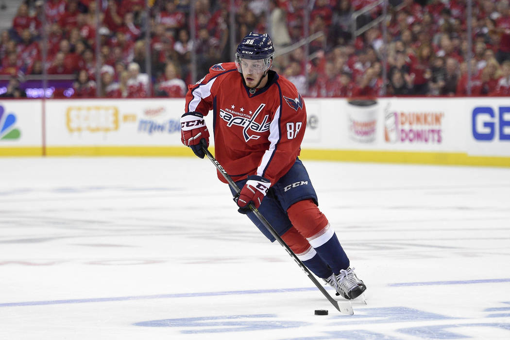 Washington Capitals defenseman Nate Schmidt (88) skates with the puck during the second period of Game 2 in an NHL hockey Stanley Cup second-round playoff series against the Pittsburgh Penguins, S ...