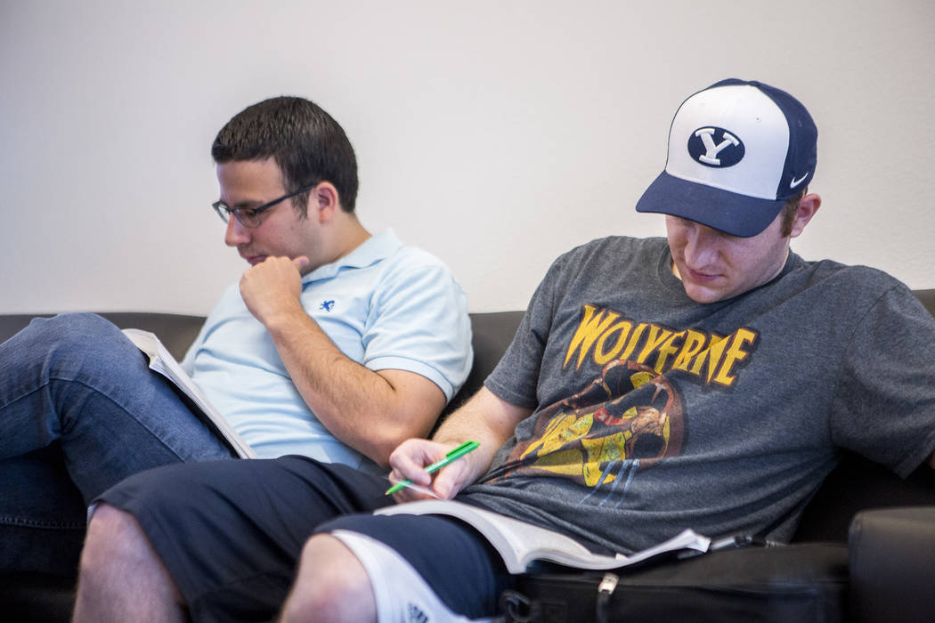 Shea Billadeau, right, and Jorge Alvarez study for the Nevada bar exam while waiting to register at UNLV on Monday, July 24, 2017.  Patrick Connolly Las Vegas Review-Journal @PConnPie
