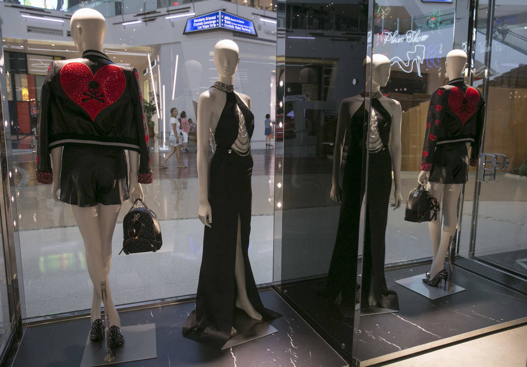 Louis Vuitton Store Window with 2 Female Mannequins Wearing Black