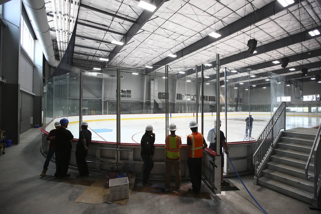 Finishing touches are applied to the ice surface of one of two ice rinks at City National Arena, the Vegas Golden Knights' headquarters and training facility, in Las Vegas on Wednesday, Aug. 2, 20 ...
