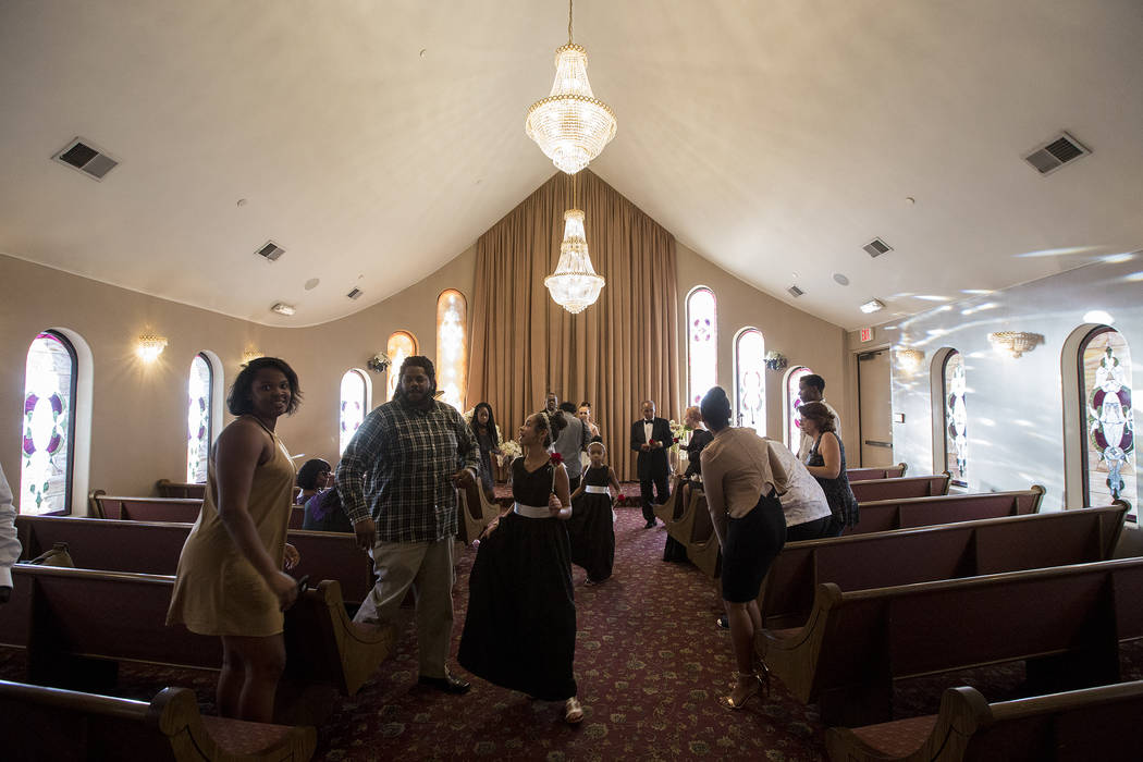 Family and friends of Patricia Robinson and Aubrey Robinson clear the chapel after they renewed their vows at Vegas Weddings in Las Vegas on Saturday, Aug. 12, 2017. Bridget Bennett Las Vegas Revi ...