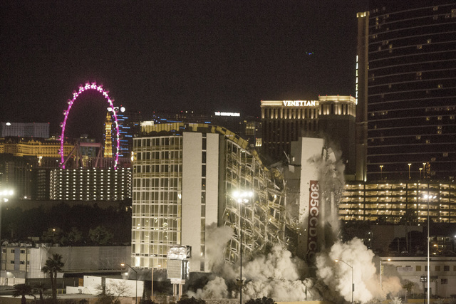 The Clarion is imploded early Tuesday, Feb. 10, 2015. The hotel was formerly known as the Royal Americana, Paddlewheel, Debbie Reynolds Hollywood Hotel and Greek Isles. (Jeff Scheid/Las Vegas Revi ...