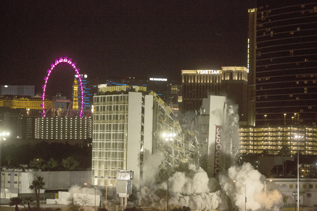 The Clarion is imploded early Tuesday, Feb. 10, 2015. The hotel was formerly known as the Royal Americana, Paddlewheel, Debbie Reynolds Hollywood Hotel and Greek Isles. (Jeff Scheid/Las Vegas Revi ...