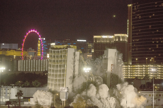 The Clarion is imploded early Tuesday, Feb. 10, 2015. The hotel was formerly known as the Royal Americana, Paddlewheel, Debbie Reynolds Hollywood Hotel and Greek Isles. (Jeff Scheid/Las Vegas Revi ...