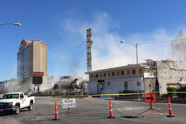 A crane was brought in Tuesday, Feb. 10, 2015, after the elevator shaft of the Clarion Hotel and Casino failed to fall during the early morning implosion of the building. (Chase Stevens/Las Vegas  ...