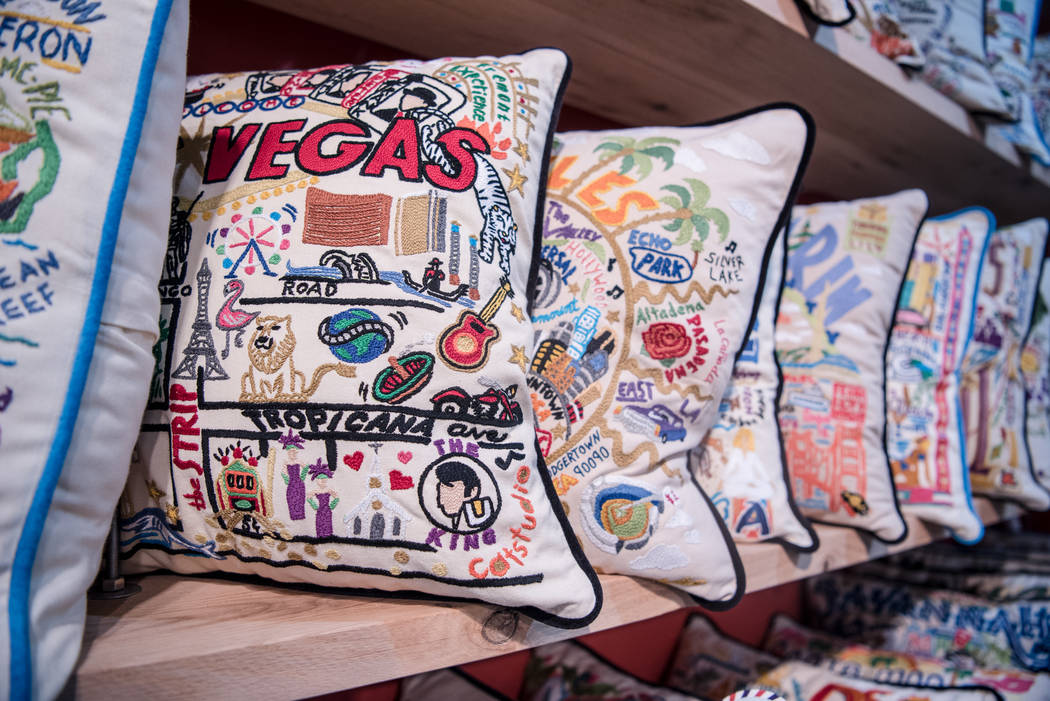 Pillows designed for individual cities and states sit on a display shelf at Las Vegas Market at World Market Center on Tuesday, August 1, 2017, in Las Vegas. Morgan Lieberman Las Vegas Review-Journal