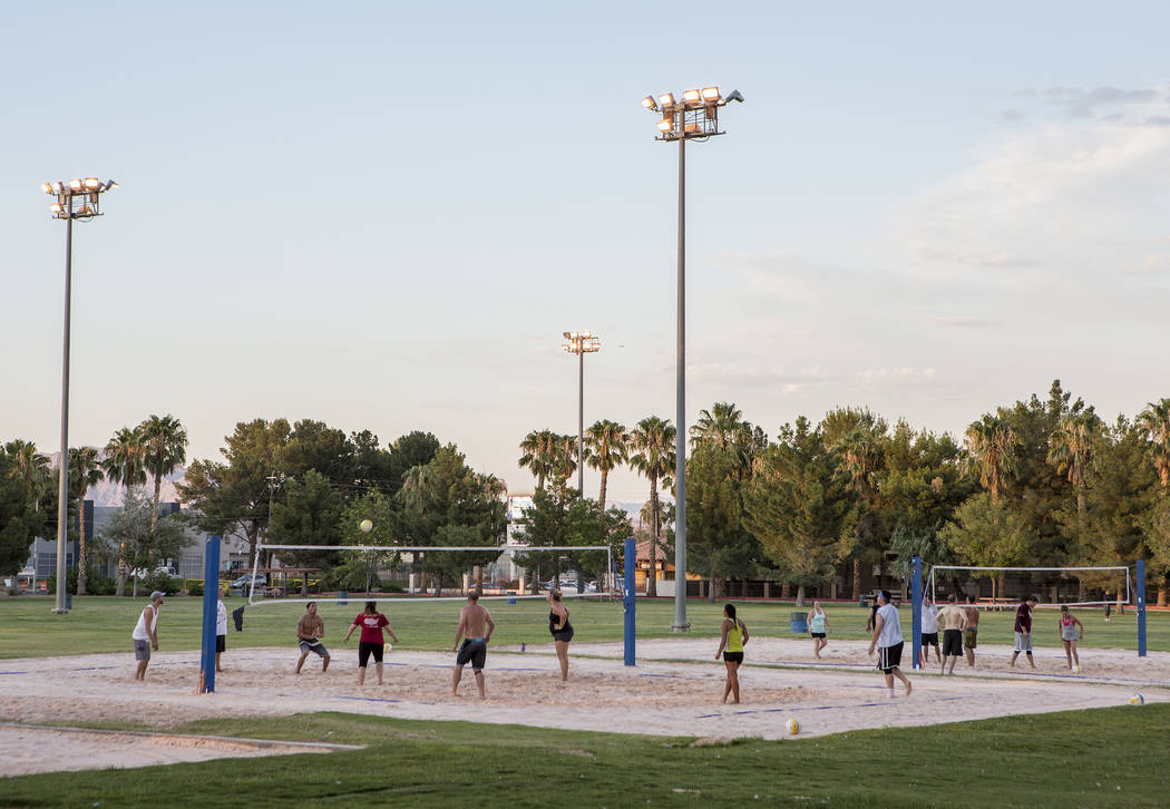 Visitors play volleyball as the sun sets at Sunset Park in Las Vegas on Tuesday, Aug. 1, 2017. Bridget Bennett Las Vegas Review-Journal @bridgetkbennett