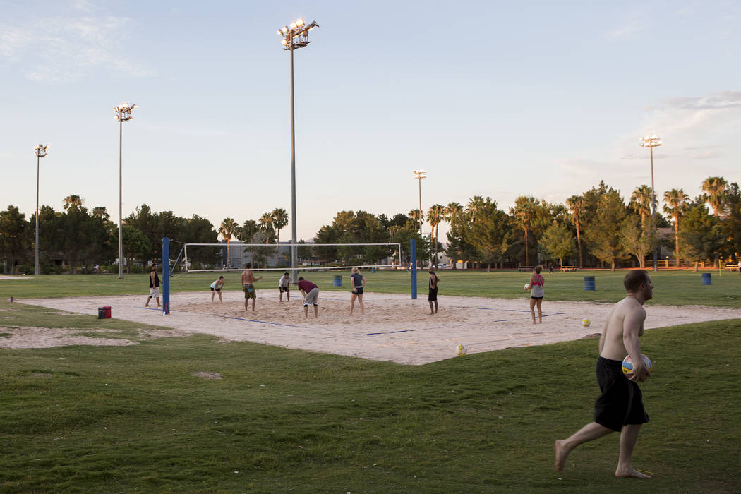 Visitors play volleyball as the sun sets at Sunset Park in Las Vegas on Tuesday, Aug. 1, 2017. Bridget Bennett Las Vegas Review-Journal @bridgetkbennett