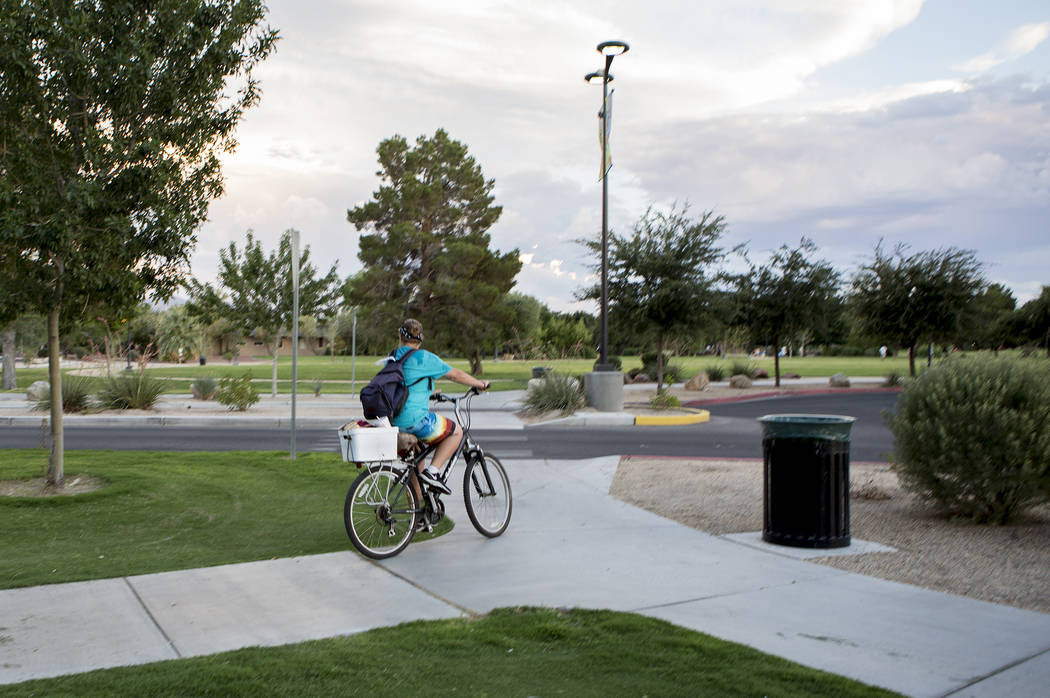 A woman bikes through Sunset Park in Las Vegas on Tuesday, Aug. 1, 2017. Bridget Bennett Las Vegas Review-Journal @bridgetkbennett