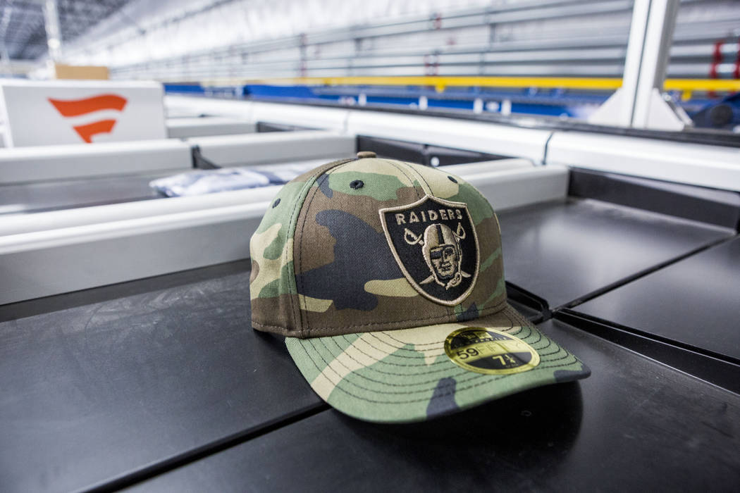 An athletic logo hat on a conveyer belt at the Fanatics distribution center in North Las Vegas, Wednesday, Aug. 16, 2017. (Elizabeth Brumley/Las Vegas Review-Journal)