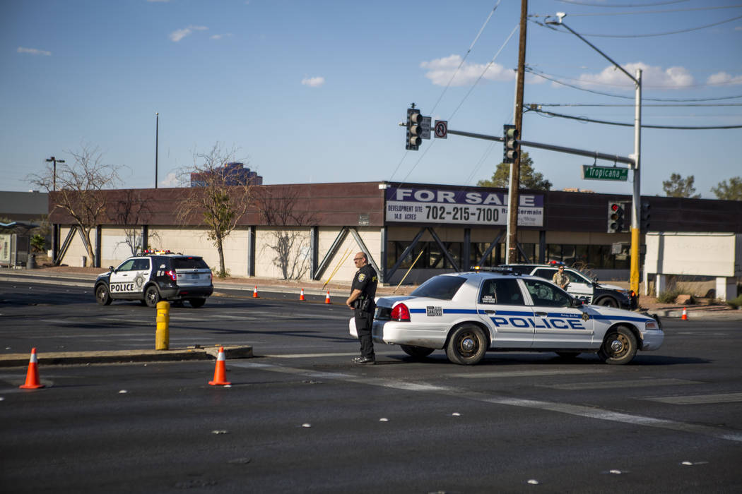 Police block off the intersection of Tropicana Avenue and Arville Street after an officer-involved shooting in which an officer was injured on Tuesday, August 1, 2017.  Patrick Connolly Las Vegas  ...